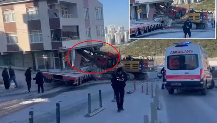 Yokuştan kayan iş makinesi apartmana daldı